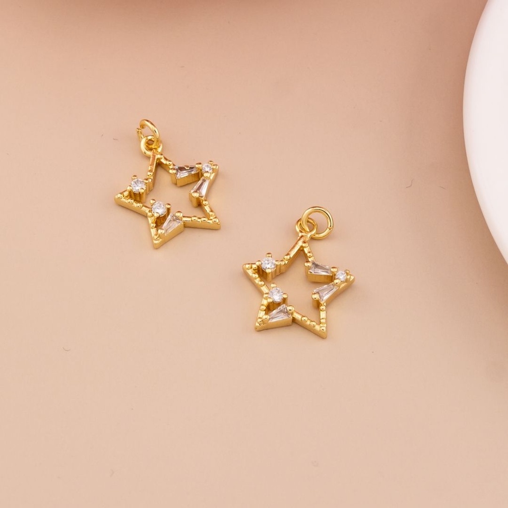Dije de estrella con micropave baño 18k