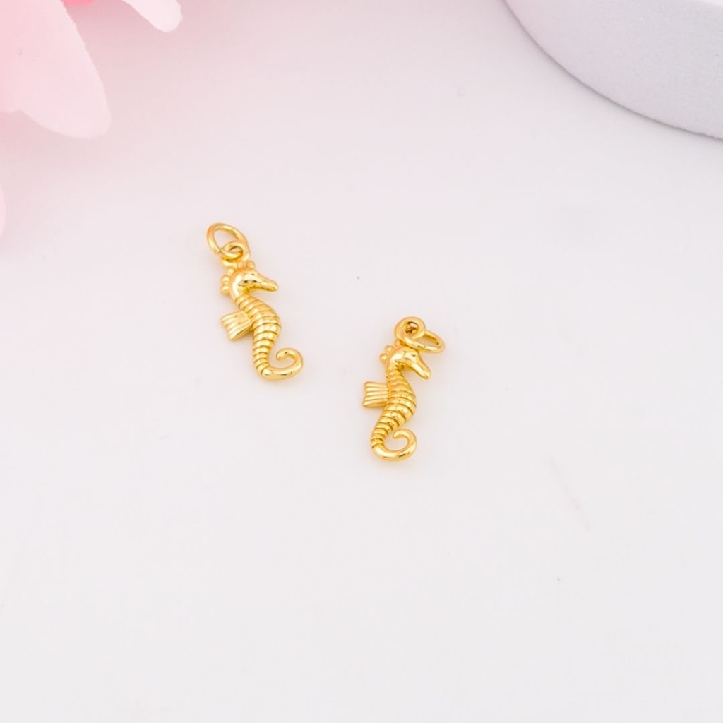 Dije caballito de mar baño 18k