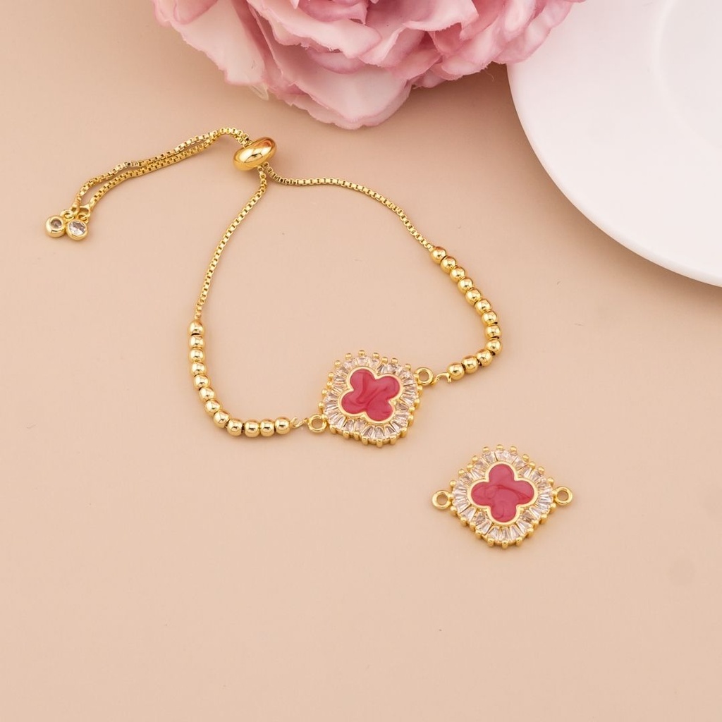 Enlace de trebol con zirconias baño 18k