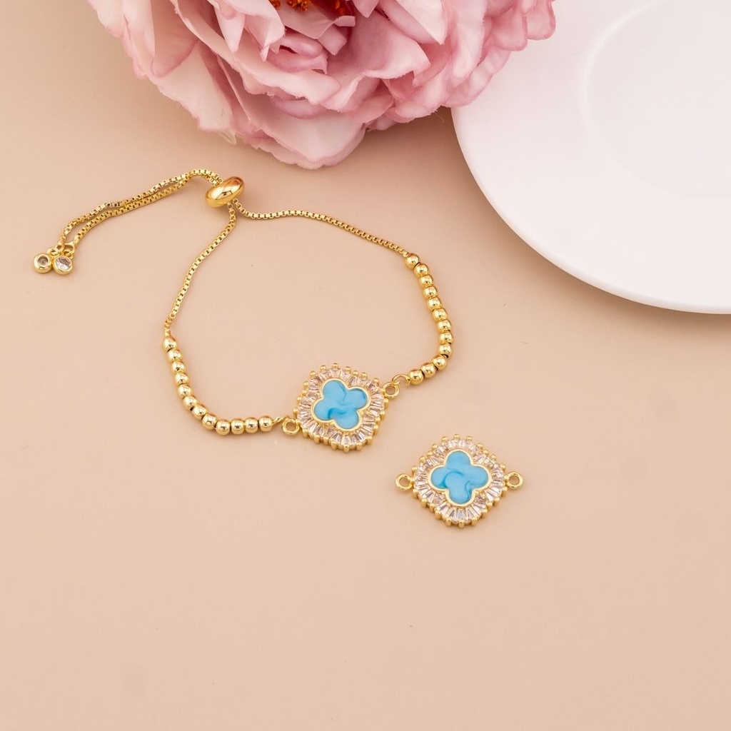 Enlace de trebol con zirconias baño 18k turqueza