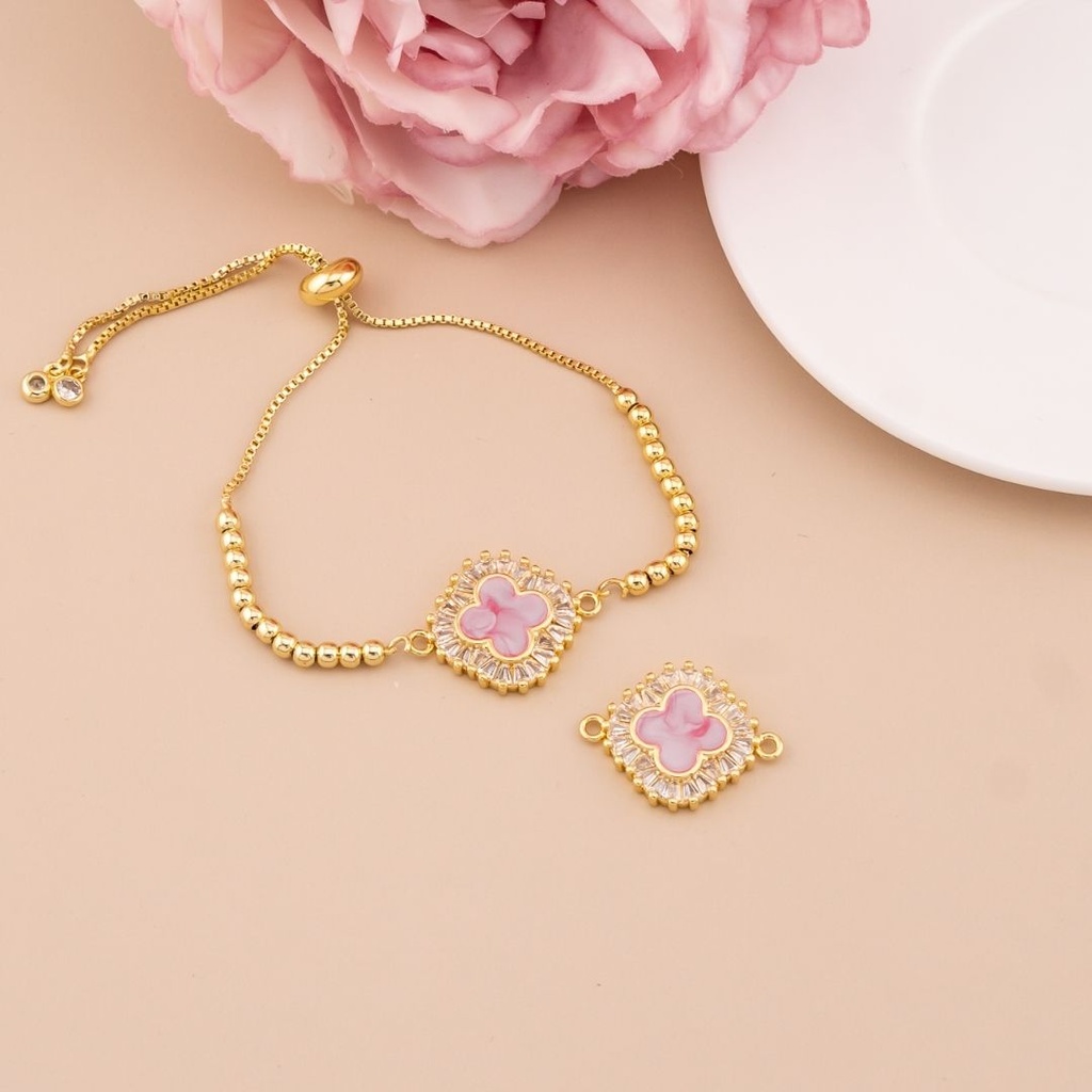 Enlace de trebol con zirconias baño 18k rosa