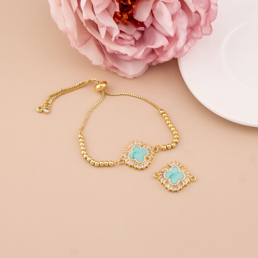 Enlace de trebol con zirconias baño 18k