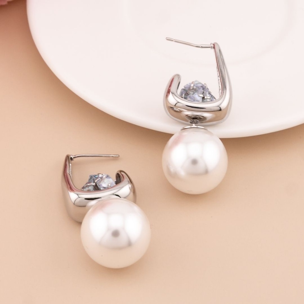 Aretes triple uso con perla y zirconias baño 18k