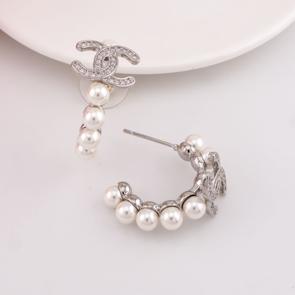 Argollas de marca con perlas y zirconias baño 18k plat
