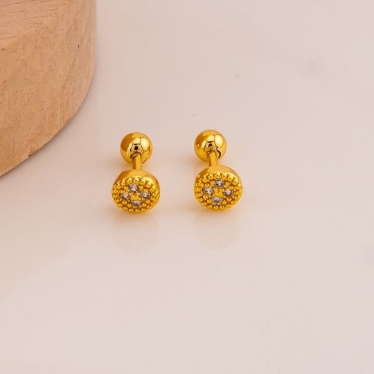 Piercing redondo con zirconias baño 18k