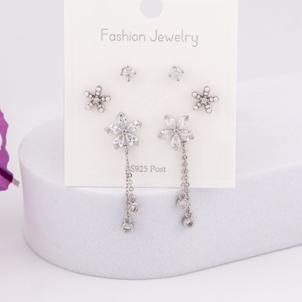 Set de piercings de flores con zirconias baño 18k plat