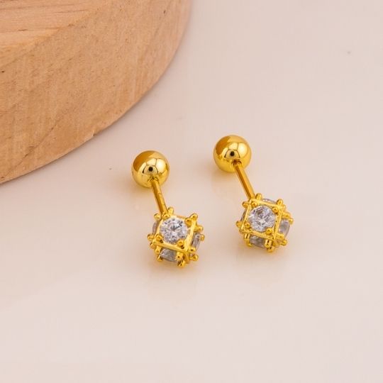 Piercing redondo con zirconias baño 18k