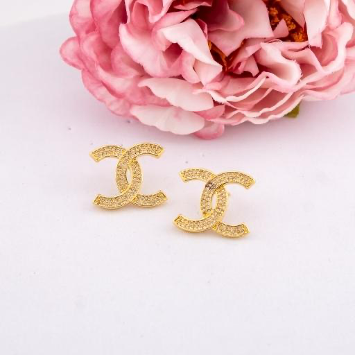 Aretes de marca con zirconias baño 18k