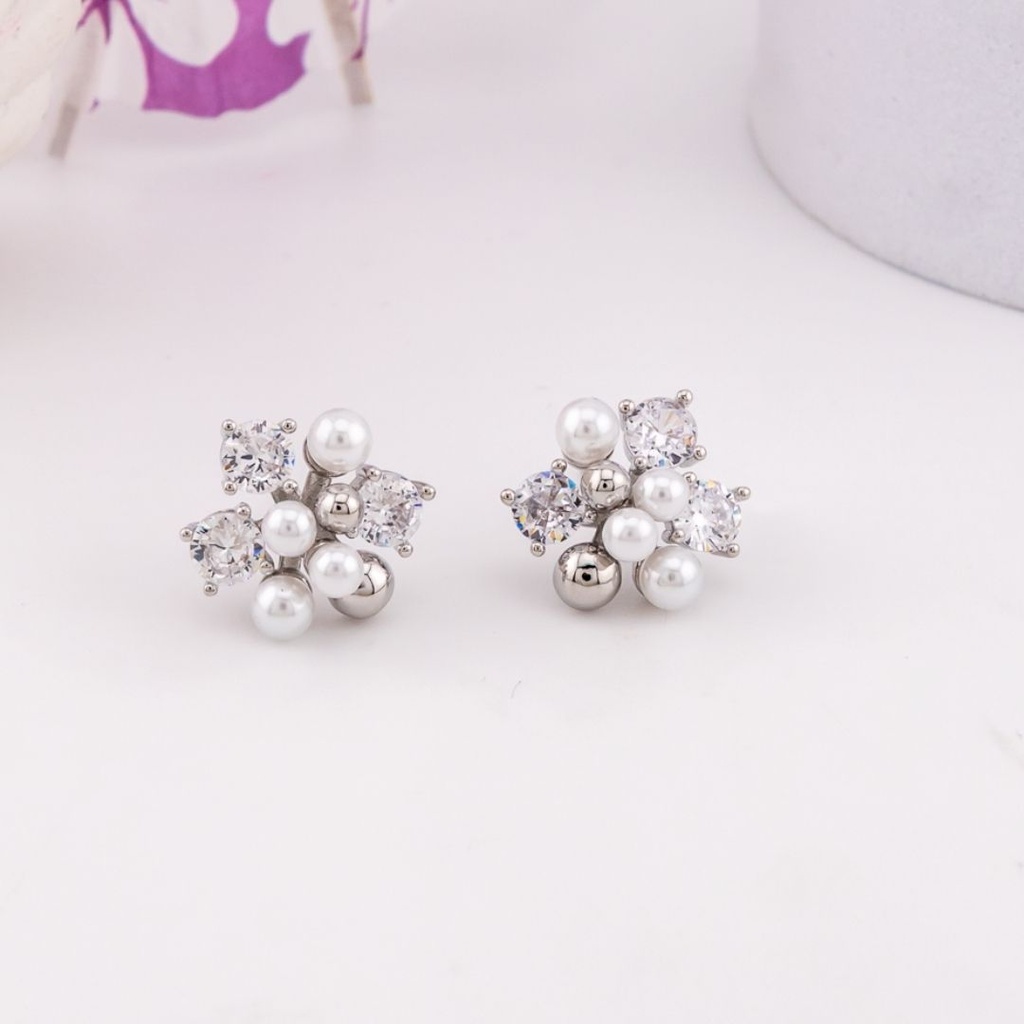 Aretes stud de perlas y zirconias baño 18k plat