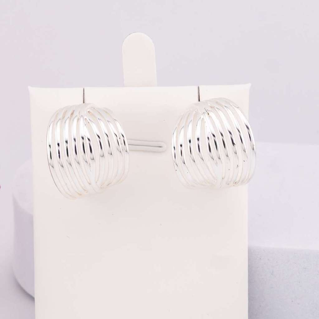 Aretes stud tipo argollas baño 18k plat
