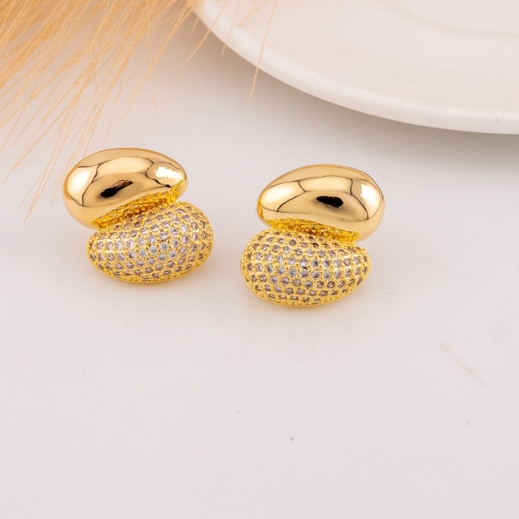 Aretes stud con zirconias baño 18k