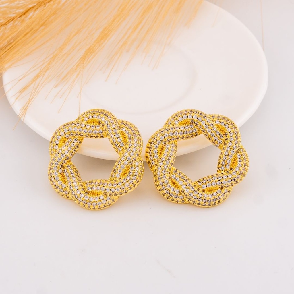 Aretes stud con zirconias baño 18k