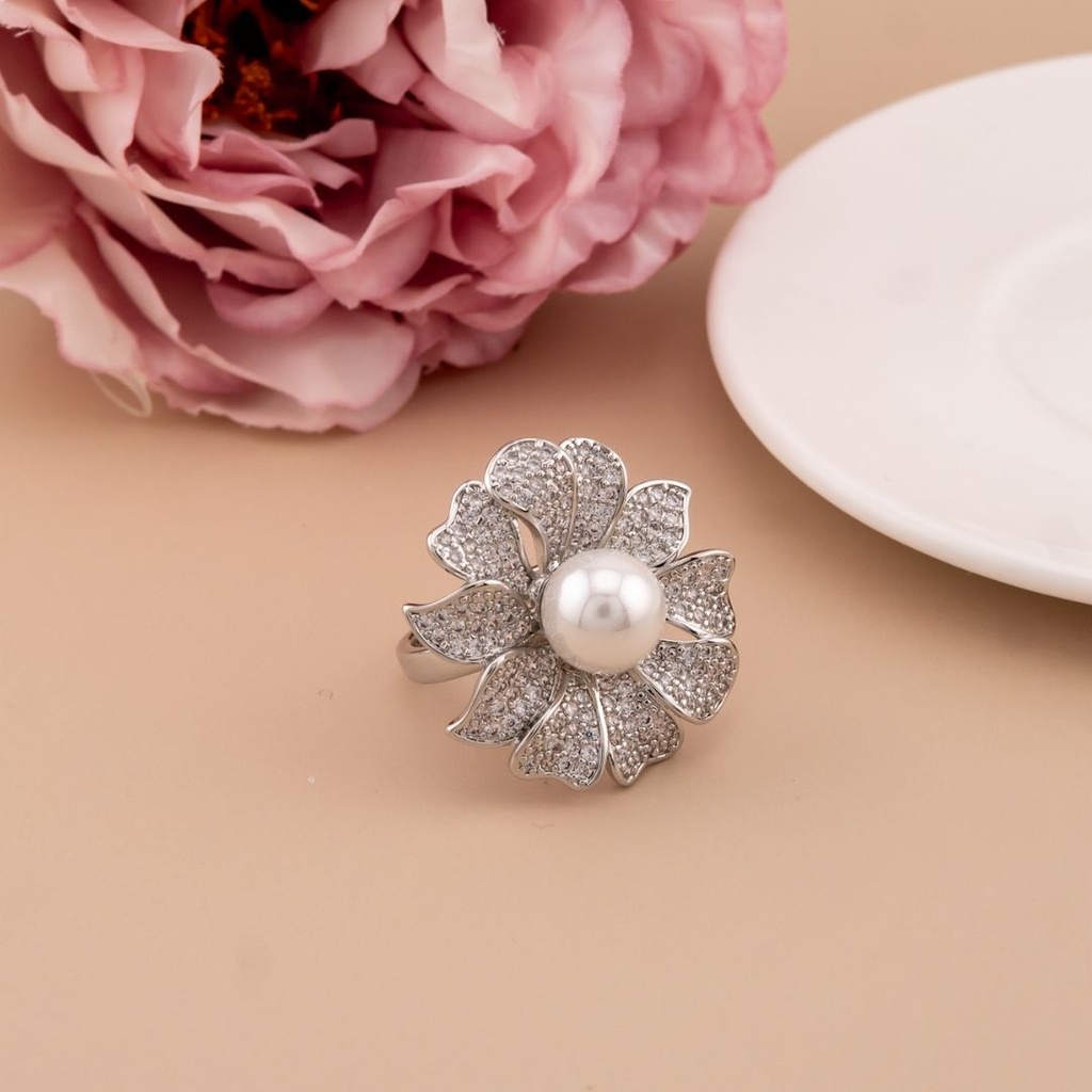 Anillo de flor con zirconias baño 18k plat