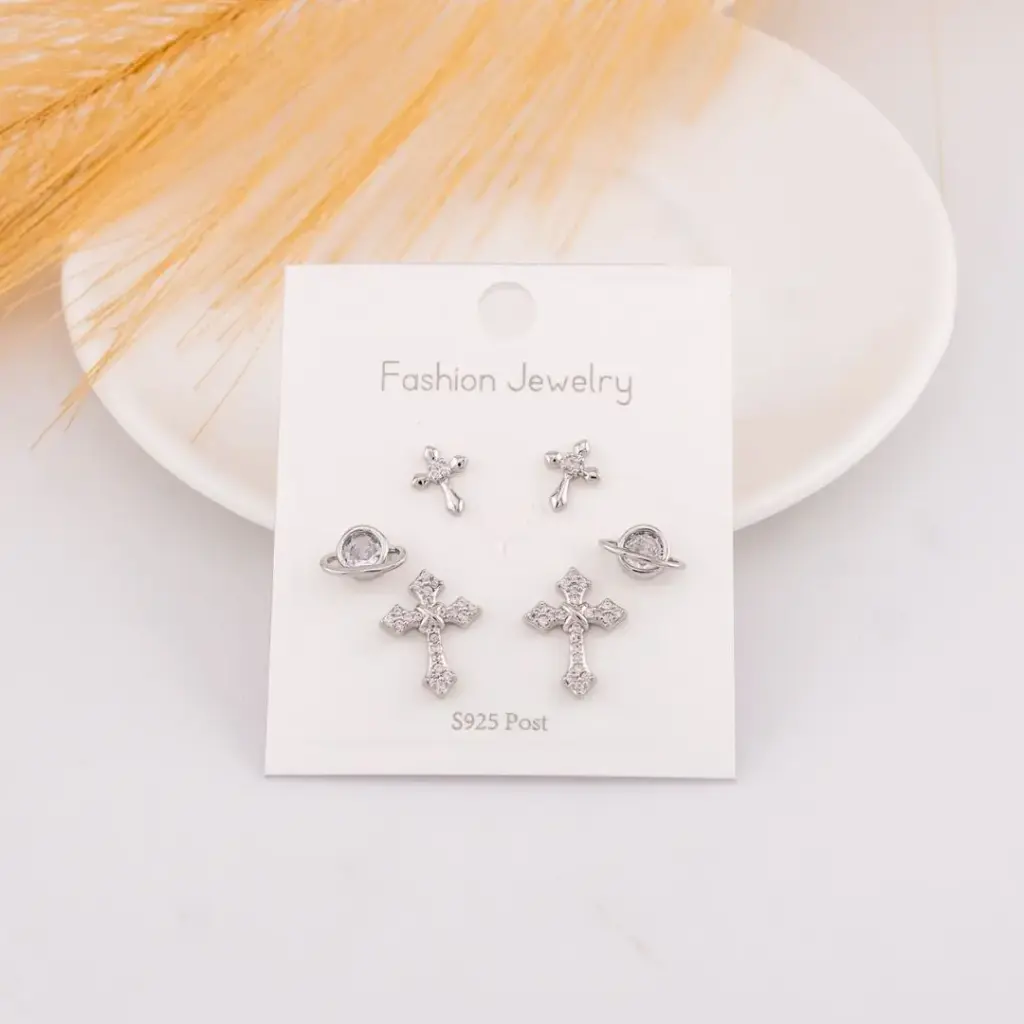 Set de piercings de cruces con zirconias baño 18k plat
