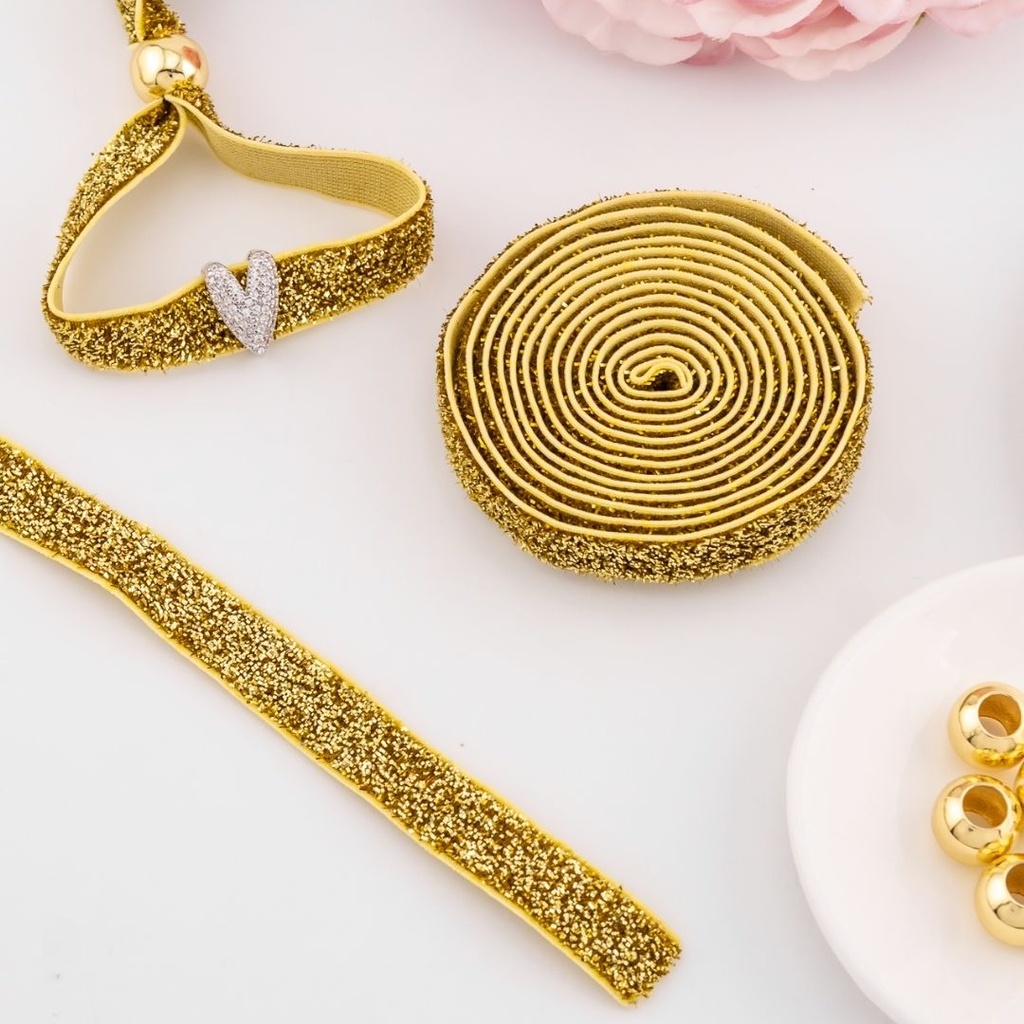 Cinta elastica escharchada color dorado