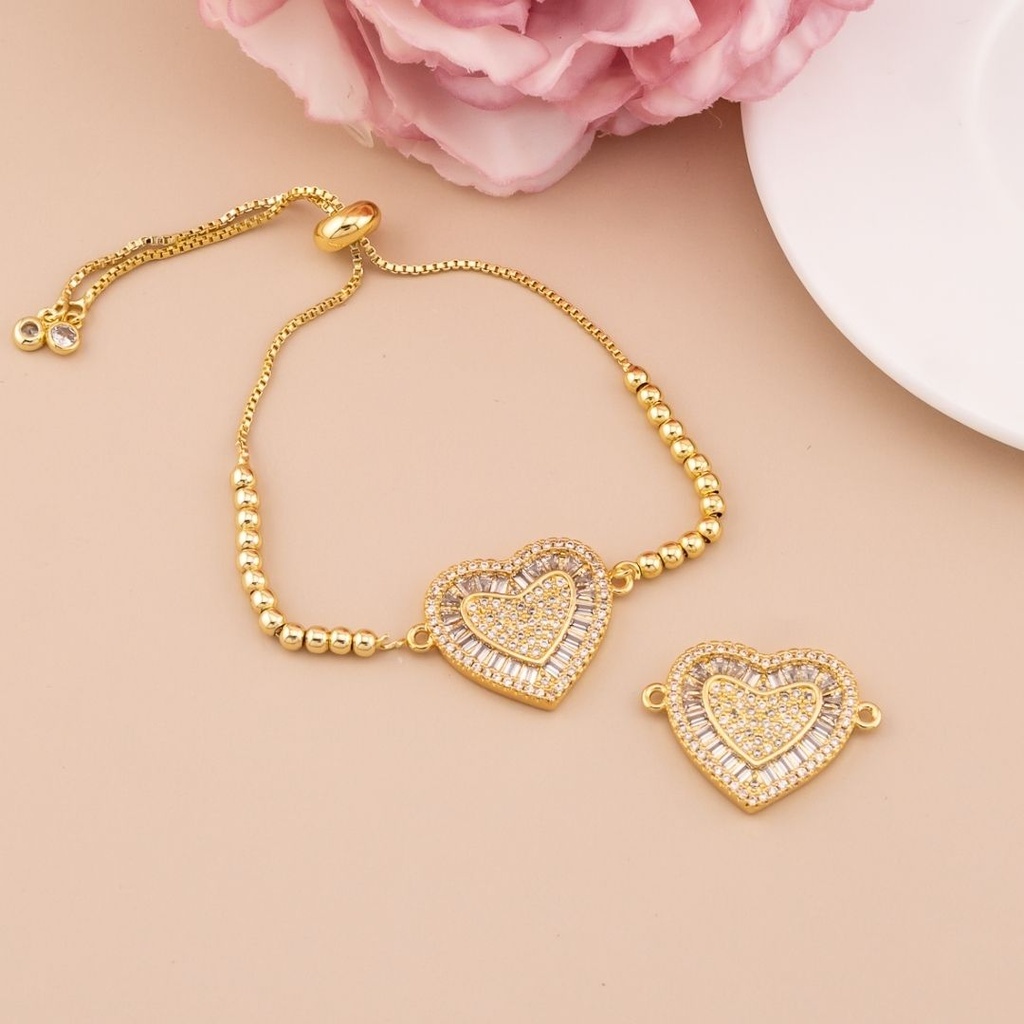 Enlace de corazón con zirconias baño 18k