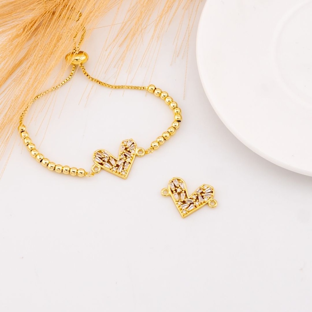 Enlace de corazon con zirconias baño 18k