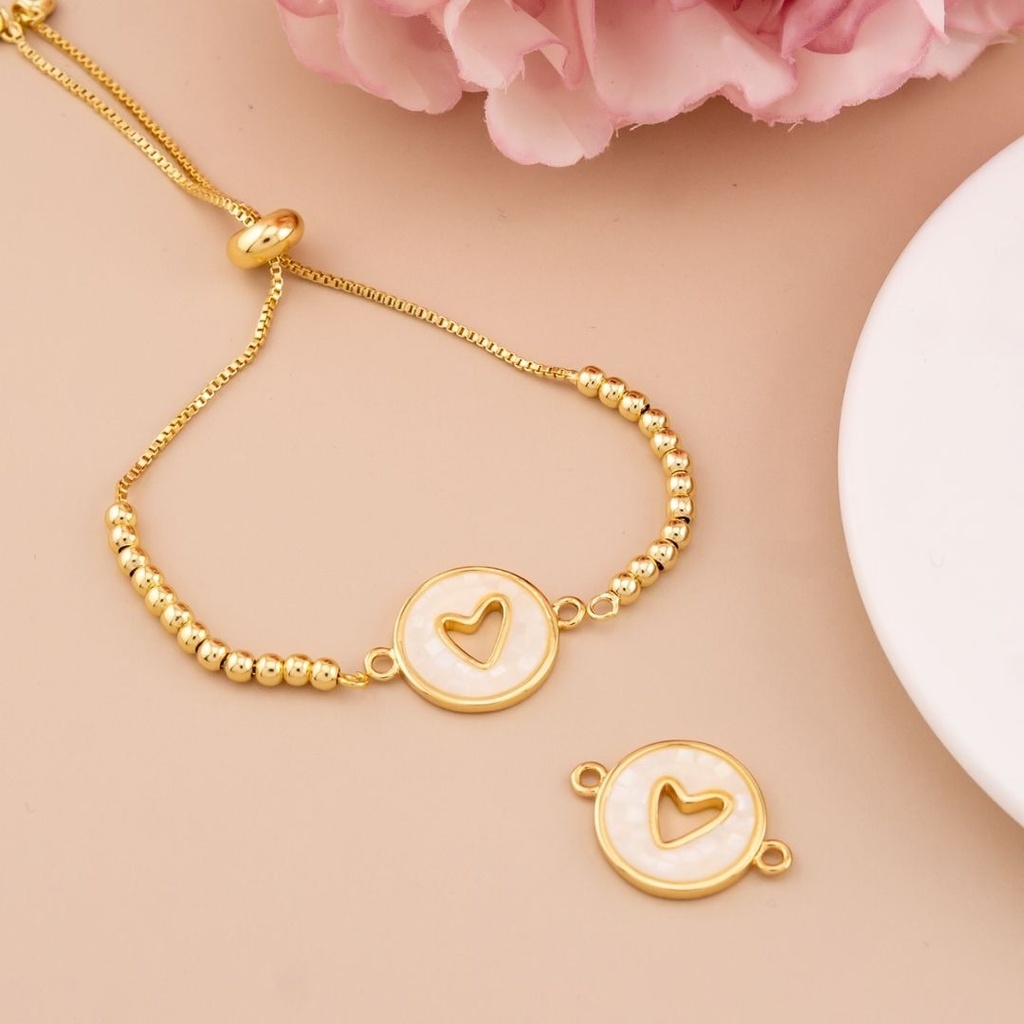Enlace de corazon con concha nacar baño 18k