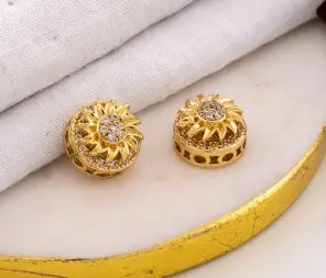 Separador giratorio de flor con zirconia