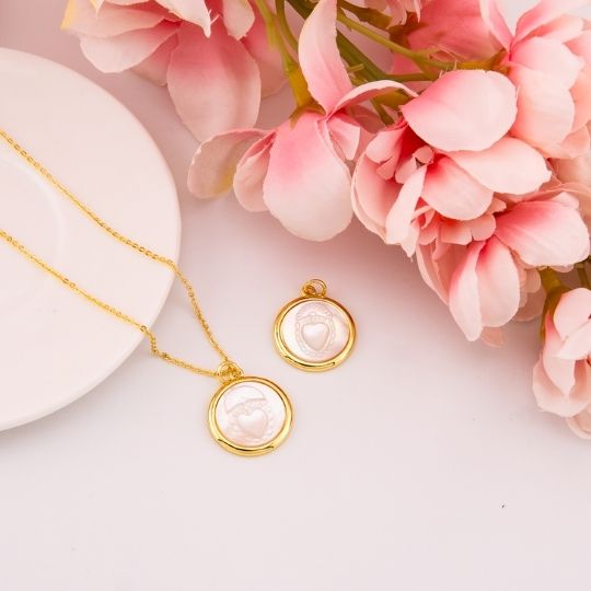 Dije medalla religiosa SAGRADO CORAZON baño 18k