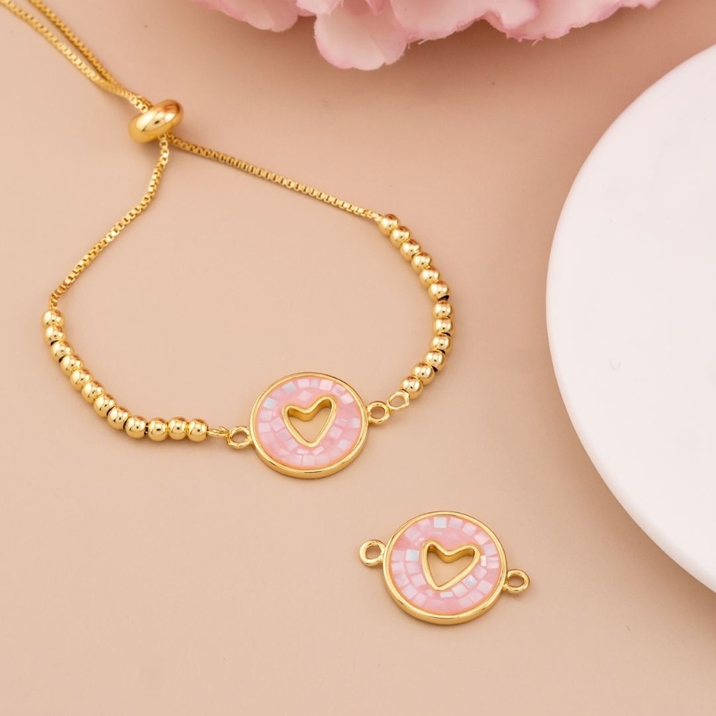 Enlace de corazon con concha nacar baño 18k