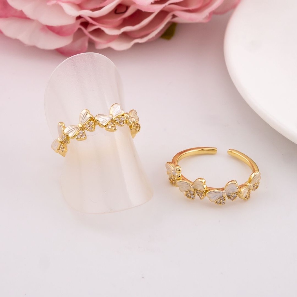 Anillo ajustable de mariposas con zirconias baño 18k
