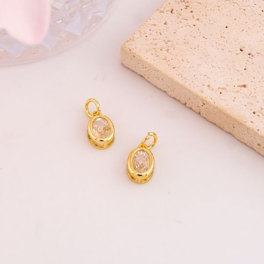 Dije ovalado con zirconia baño 18k AB