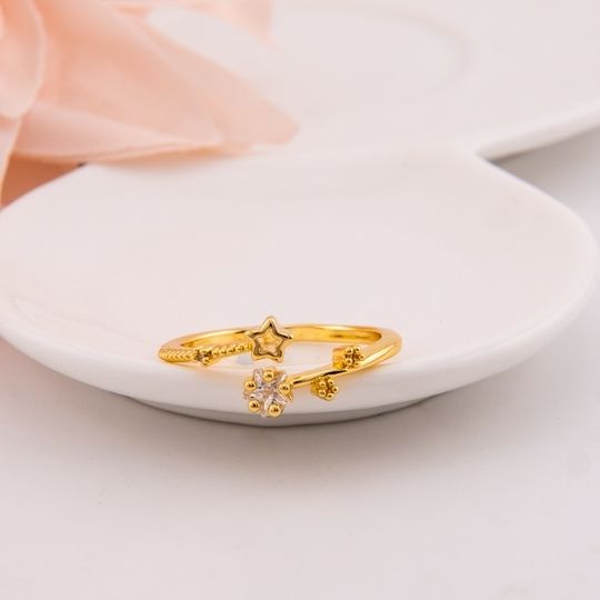 Anillo ajustable de estrella con zirconias baño 18k