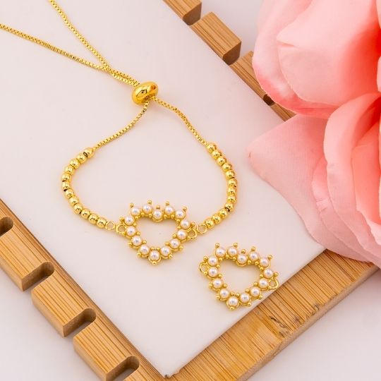 Enlace redondo con perlas baño 18k