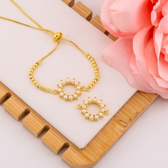 Enlace redondo con perlas baño 18k