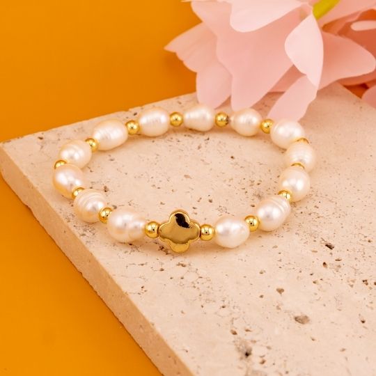 Pulsera elastica de perlas naturales baño 18k