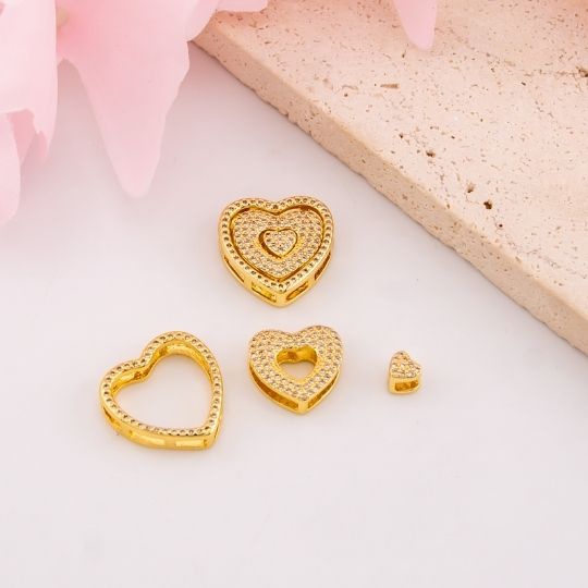 Separador triple de corazon con micropave baño 18k