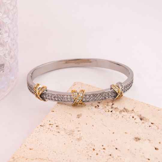 Brazalete de marca con zirconias baño 18k