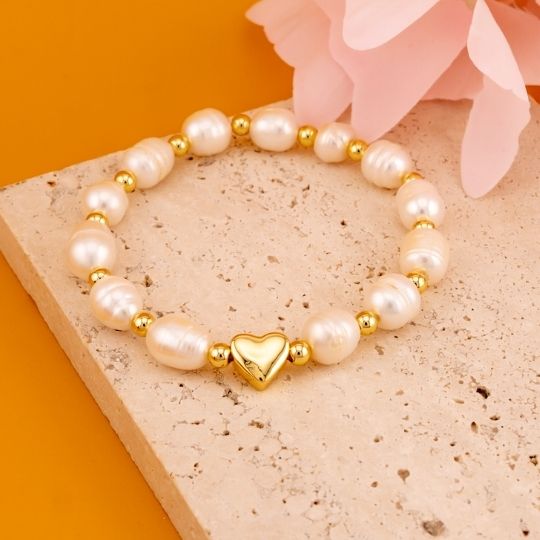 Pulsera elastica de perlas naturales baño 18k