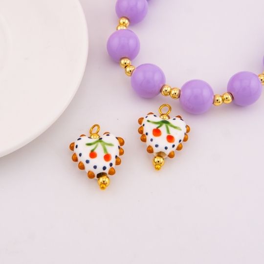 Dije de ceramica vitrificado con diseño de cereza baño 18k
