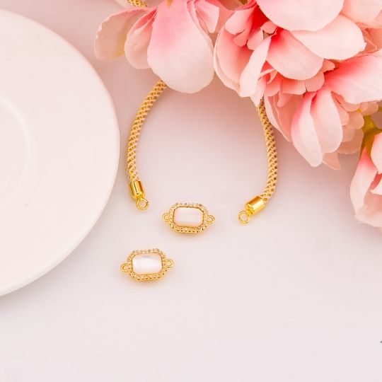 Enlace cuadrado con zirconias y baño 18k
