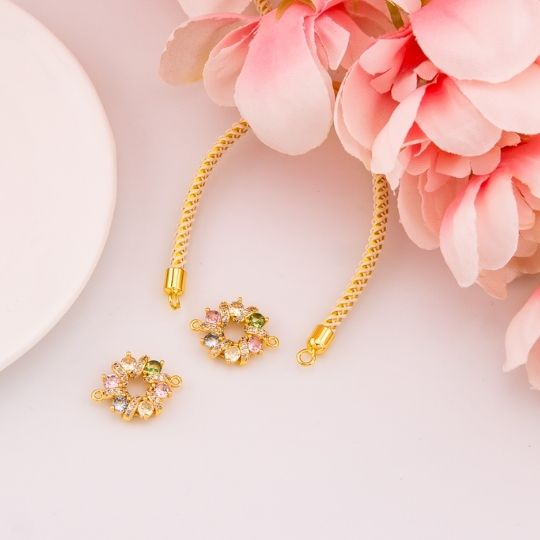 Enlace redondo con zirconias y baño 18k