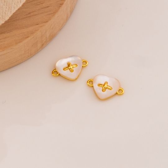 Enlace de corazon en concha nacar baño 18k