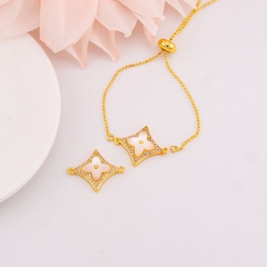 Enlace de trebol con madre perla en micropave