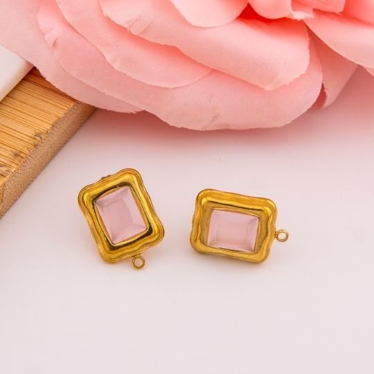 Patente rectangular con zirconia rosada en acero inoxidable