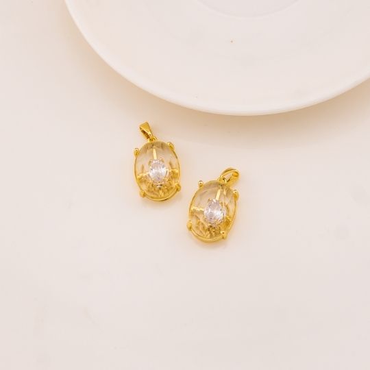 Dije ovalado en cristal baño 18k
