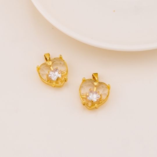 Dije de corazon en cristal baño 18k