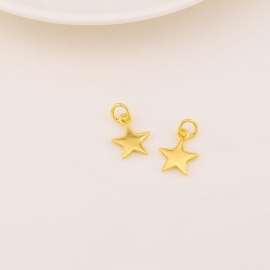 Dije estrellita baño 18k