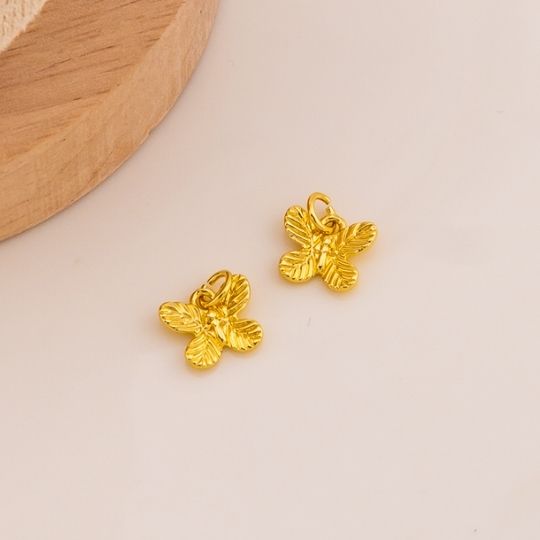 Dije de mariposa mini solido baño 18k