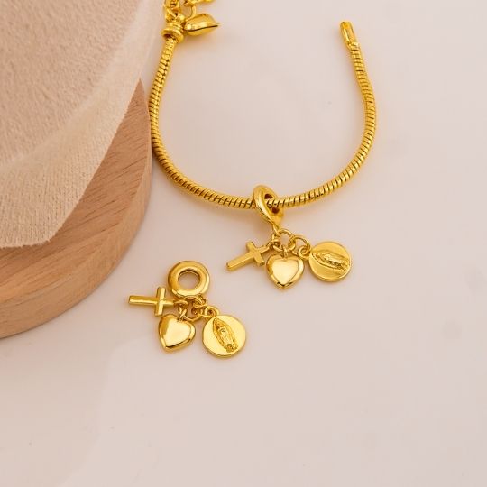 Charm religioso triple baño 18k