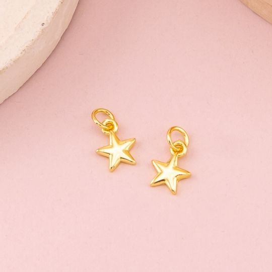 Dije mini de estrella baño 18k