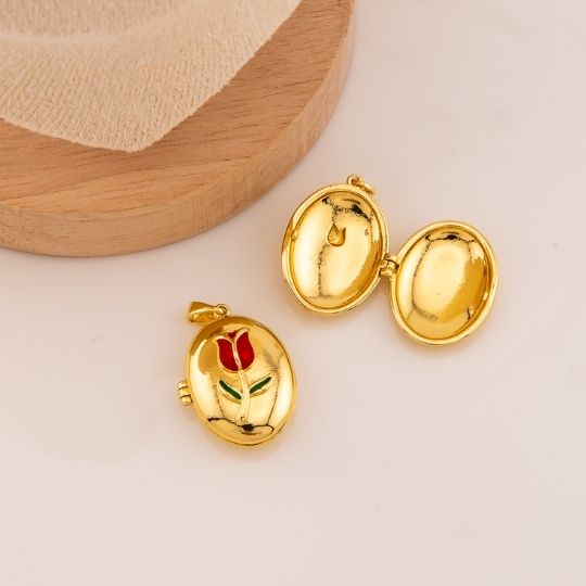 Relicario ovalado con figura de tulipan baño 18k