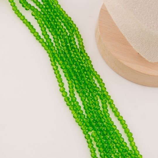 Cristal Rondelle verde bosque traslucido 2mm
