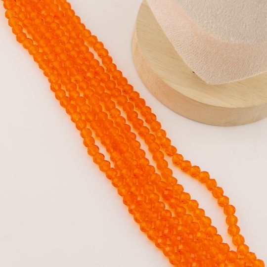 Cristal Rondelle naranja traslucido 2mm