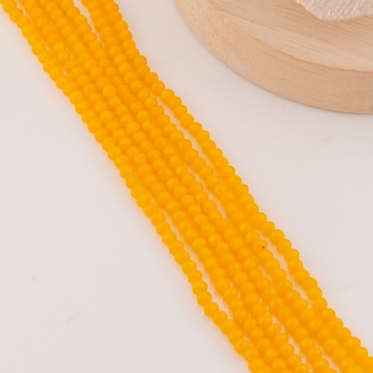 Cristal Rondelle naranja 2mm